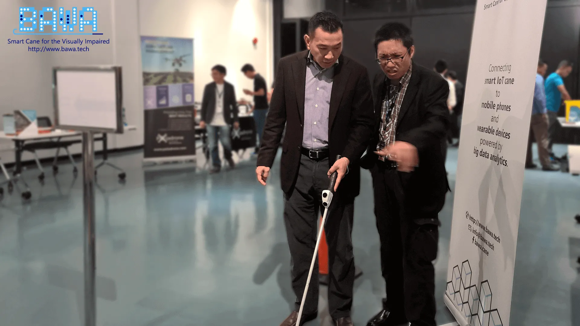 Dato Loh Yuen Tuck from The IoT Solutions Sdn Bhd listens on while Daniel Vong is explaining how to use a white cane. Dato Loh Yuen Tuck from The IoT Solutions Sdn Bhd listens on while Daniel Vong is explaining how to use a white cane.